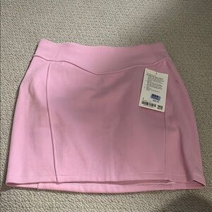 Brand new Pink lululemon scuba mini skirt